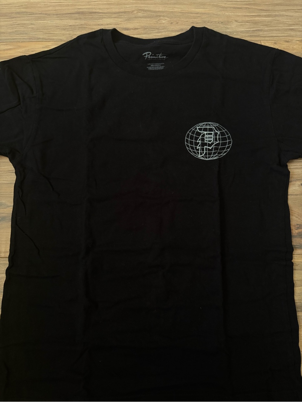 Primitive Black Tee with Silver Globe Logo